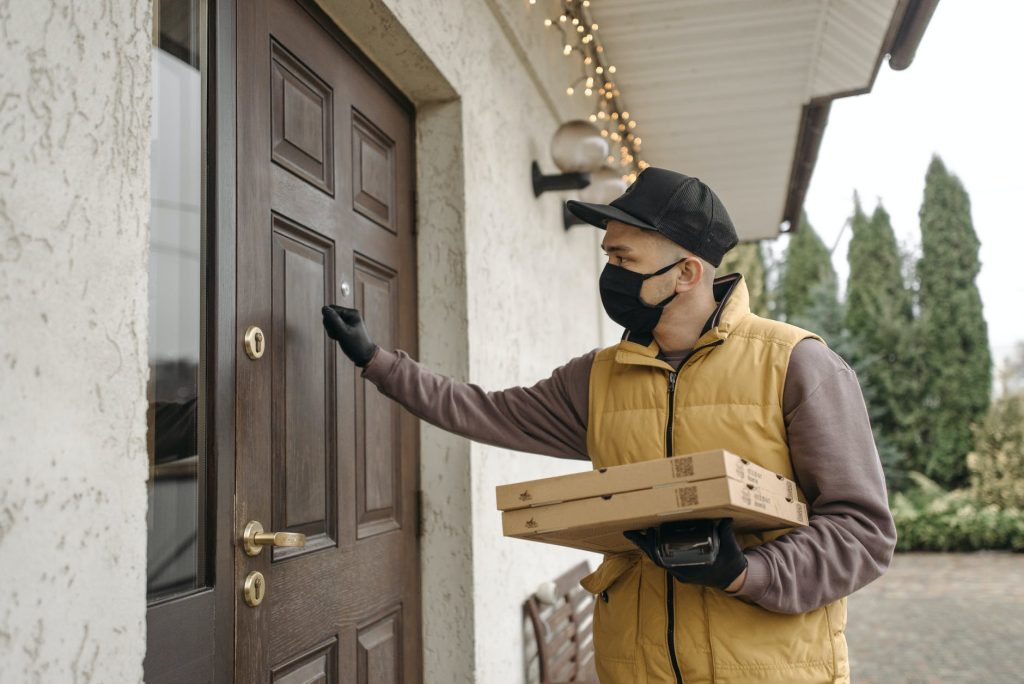 delivery man knocking on door a door