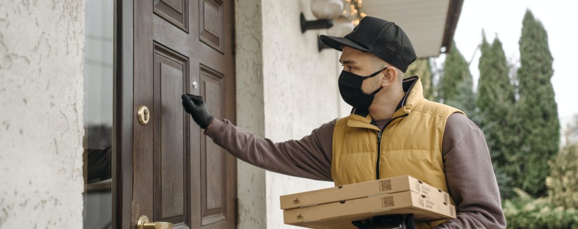 delivery man knocking on door a door