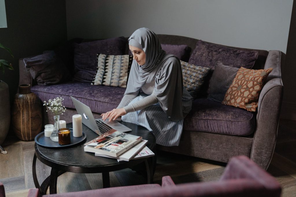woman in hijab works from her hybrid office