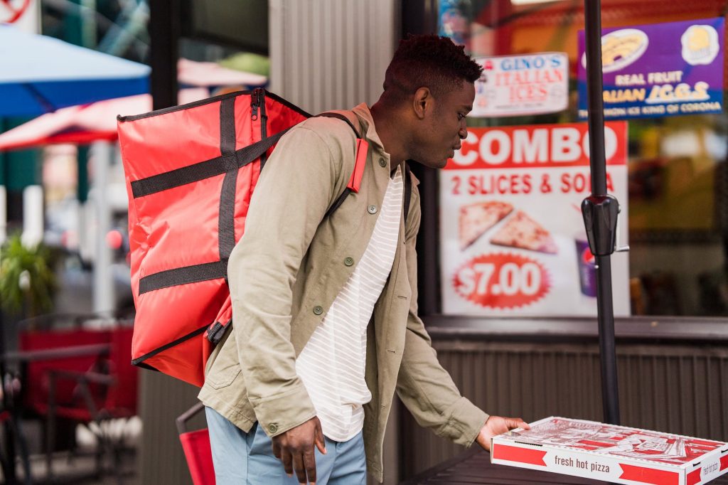 delivery driver with pizza