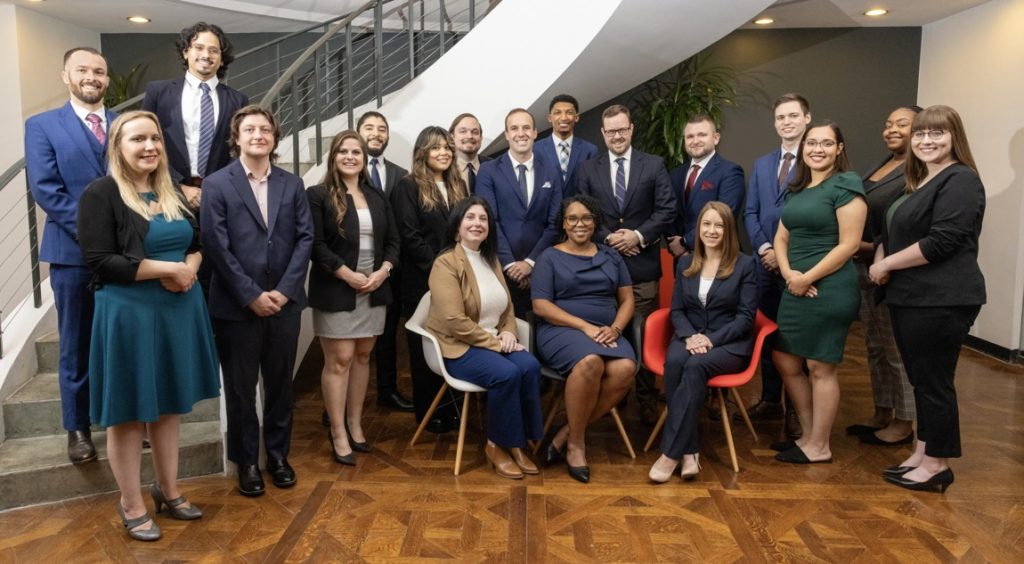 The Forester Haynie team posed in professional attire in their office.